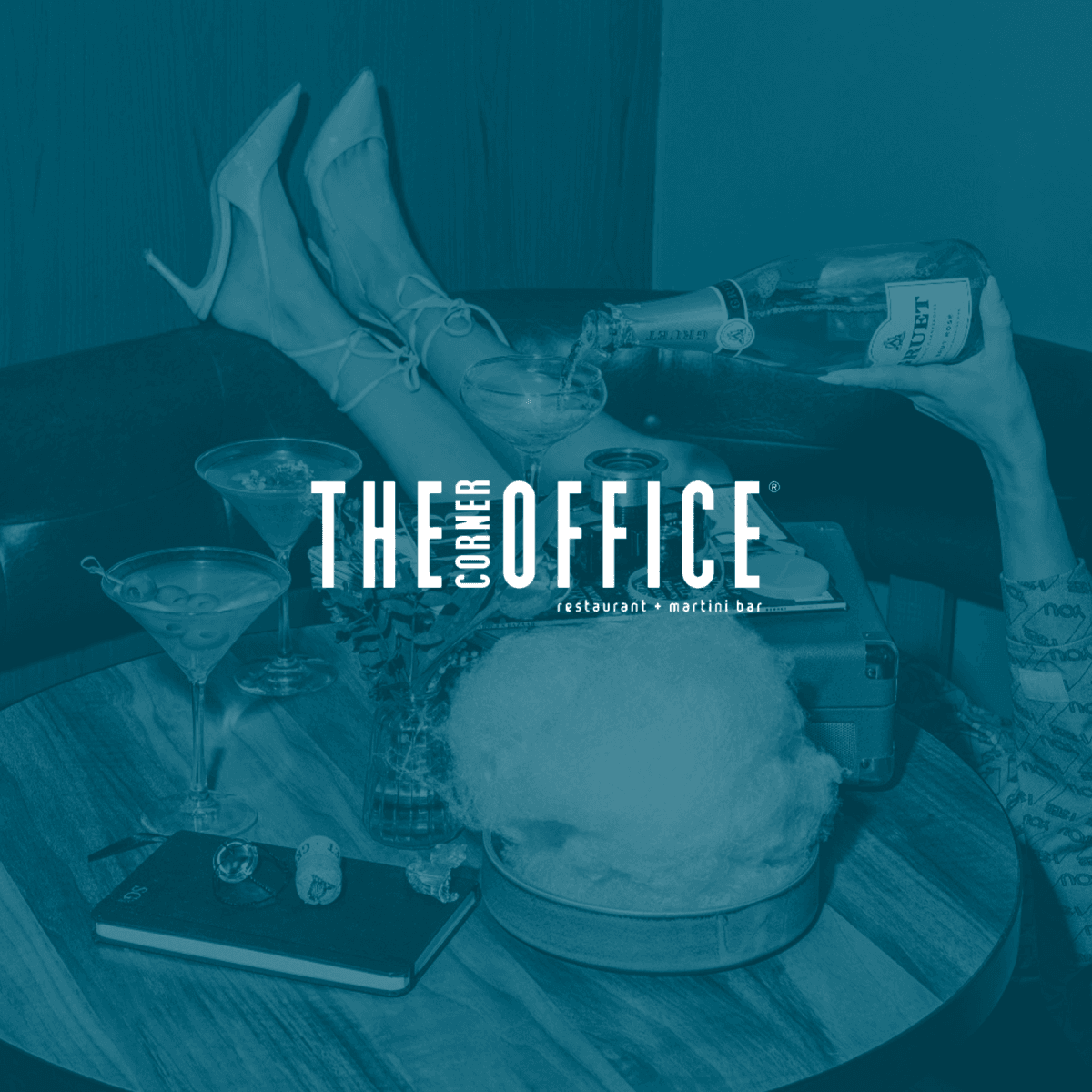 The Corner Office Restaurant + Martini Bar logo