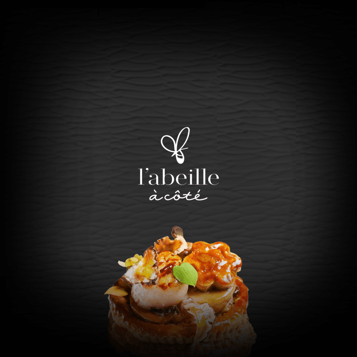 L'abeille à côté logo