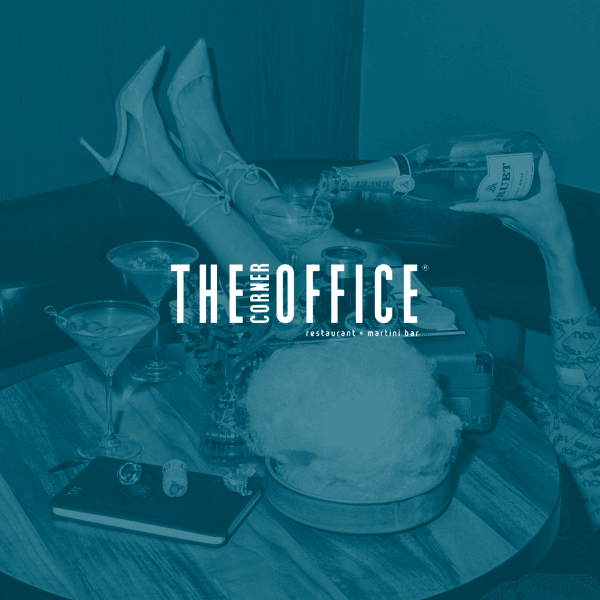 The Corner Office Restaurant + Martini Bar logo