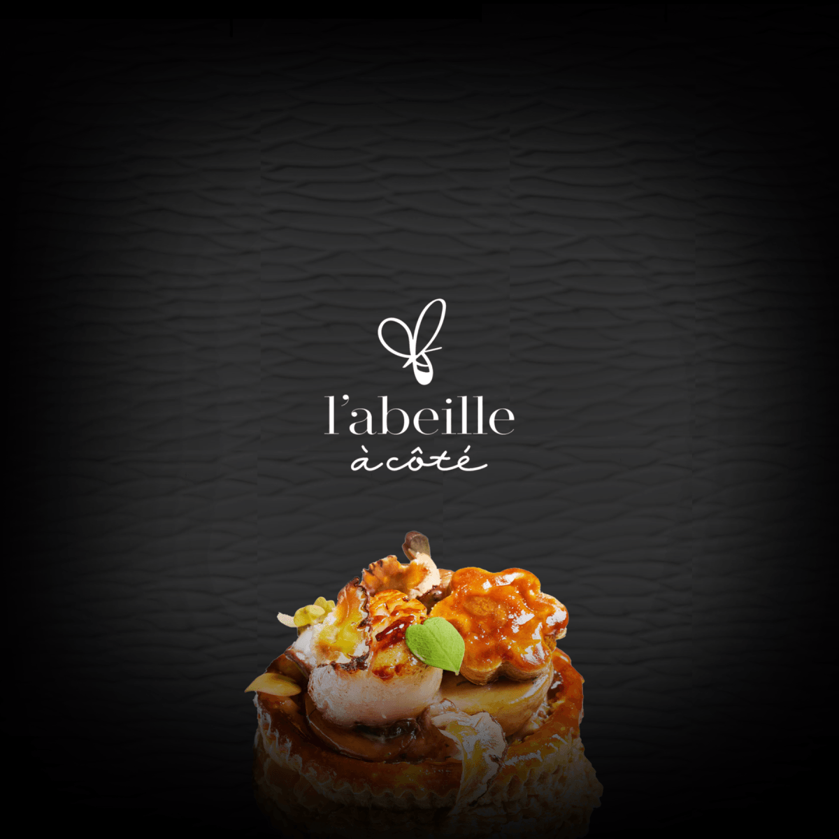 L'abeille à côté logo